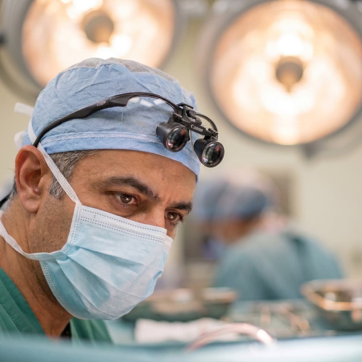 Board-certified surgeon in the operating room